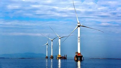 Offshore wind turbines illustrating renewable energy growth alongside global LNG trends